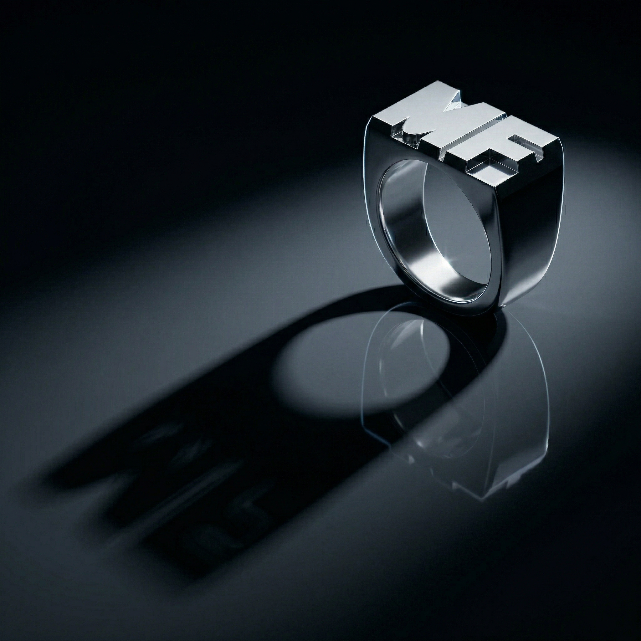 Source image of a polished silver MF signet ring